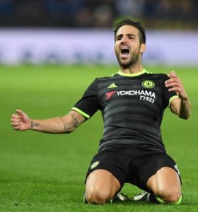 Chelsea’s Spanish midfielder Cesc Fabregas celebrates scoring their fourth goal during extratime in the English League Cup third round football match between Leicester City and Chelsea at King Power Stadium in Leicester, central England on Wednesday. AFP PHOTO