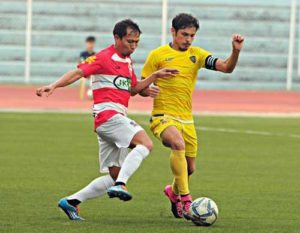 Global FC star Misagh Bahadoran (right), controls the ball in their match against JP Voltes FC in the United Football League last September 21. UFL MEDIA PHOTO