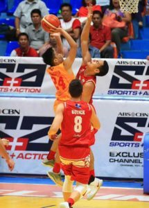 Mapua’s Laurenz Victoria (24) challenges the defense of Benedict Adamos of San Beda College as Robert Bolick (8) of San Beda looks on during NCAA Season 92 men’s basketball action on Thursday at The Arena in San Juan City. Contributed photo 