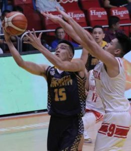 Jose Rizal University’s Ervin Grospe drives on Javee Macon of San Beda during an NCAA men’s basketball game at the San Juan Arena City on Tuesday. PHOTO BY BOB DUNGO JR.