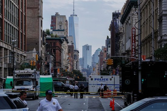 Law Enforcement Officers are seen at the scene of an explosion on West 23rd Street on Sunday (Monday in Manila) in New York. AFP PHOTO