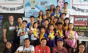 Philippine Swimming League President Susan Papa and Secretary General Maria Susan Benasa with the Most Outstanding Swimmer awardees and champion coaches in the Philippine Swimming League (PSL) 101st National Series Novice and Motivational Swimming Meet held at the Diliman Preparatory School swimming pool in Quezon City. CONTRIBUTED PHOTO