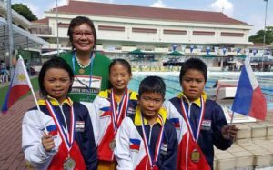 Philippine Swimming League President Susan Papa with medallists Trizia Haileyana Tabamo, Aubrey Tom, Master Charles Janda and Marc Bryan Dula. CONTRIBUTED PHOTO 