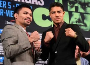 Boxers Manny Pacquiao (left) of the Philippines and Jessie Vargas of the US pose for the cameras at a press conference in Beverly Hills, California, on Friday, where their November 5th fight was announced. AFP PHOTO