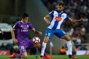 Real Madrid’s Colombian midfielder James Rodriguez (right) vies with Espanol’s Brazilian forward Leo Baptistao during the Spanish league football match RCD Espanyol vs Real Madrid CF at the Cornella-El Prat stadium in Cornella de Llobregat on Monday. AFP PHOTO