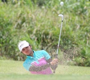 Princess Superal blasts out of the bunker on No. 15 en route to saving par from 10 feet. CONTRIBUTED PHOTO