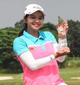 Princess Superal beams as she holds her first pro championship trophy. CONTRIBUTED PHOTO