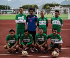 The members of the Lhasa Pureland Football Club pose for a group picture at their football stadium in the regional capital Lhasa, in China’s Tibet Autonomous Region. Officials hope the highest club in China, which was established last year, can break down barriers in the mountainous region, where relations with Beijing have sometimes been strained since its “peaceful liberation” in 1951. AFP PHOTO