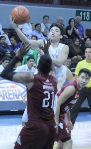 Ateneo de Manila University’s Antonio Asistio drives on University of the Philippines’ Andrew Harris during the University Athletic Association of the Philippines Season 79 men’s basketball tournament on Wednesday at the Mall of Asia Arena in Pasay City. PHOTO BY BOB DUNGO JR.