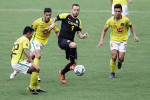 Spanish striker Adrian Gallardo Valdes (9) of Ceres La Salle FC attempts to pierce the defense of Kaya FC in their match in the United Football League on Saturday. PHOTO BY UFL MEDIA