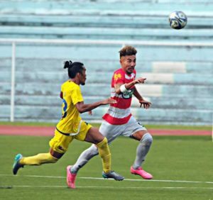 JP Voltes FC striker Takumi Uesato (right) attempts to pierce the defense of Global FC’s Jerry Barbaso (left) during their match in the United Football League on Wednesday.  UFL Media photo 