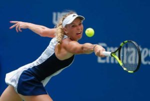 Caroline Wozniacki of Denmark hits a return to Svetlana Kuznetsova of Russia during their 2016 US Open Women’s Singles match at the USTA Billie Jean King National Tennis Center in New York on Thursday.  AFP PHOTO 