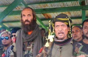 MISUARI TO THE RESCUE Moro National Liberation Front founder Nur Misuari (right) speaks while freed Norwegian national Kjartan Sekkingstad (right) listens during the latter’s turnover to government officials in Indanan, Sulu. AFP PHOTO BY NICKEE BUTLANGAN