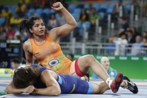 India’s Sakshi Malik (top) celebrates during her fight againt Sweden’s Malin Johanna Mattsson in their women’s 58kg freestyle qualification match on August 17, 2016, during the wrestling event of the Rio 2016 Olympic Games at the Carioca Arena 2 in Rio de Janeiro.  AFP PHOTO 