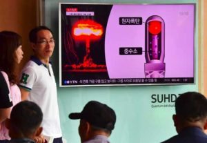 SHOCKING THE NATION  People watch a television news report on North Korea’s latest nuclear test at a railway station in Seoul on Friday. AFP PHOTO