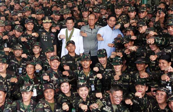 HAIL TO THE CHIEF President Rodrigo Duterte, along with Defense Secretar