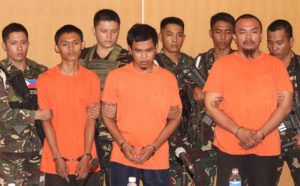 MAUTE GANG MEMBERS Defense and military officials present to the media three suspects in the September 2 bombing of the Davao City night market. From left: Musali Mustapha, Wendel Apostol Facturan and TJ Tagadaya Macabalang. PHOTO BY RUY MARTINEZ 