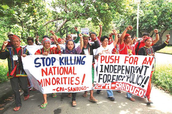 Members of indigenous groups hold a rally at the University of the Philippines in Quezon City to condemn the violent dispersal of protesters in front of the US embassy in Manila on Wednesday. PHOTO BY MIKE DE JUAN 