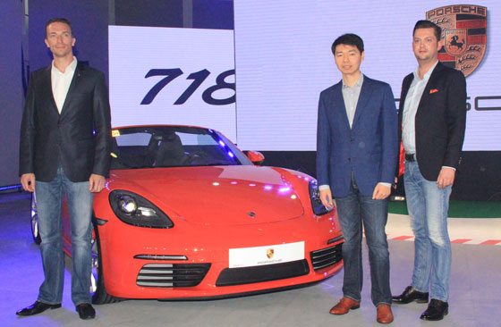  The Porsche 718 Boxster and Cayman have raced their way to the Philippine market, with executives of the German automaker attending the launch of the twin sports car models on Wednesday. Shown in the photo are Porsche Asia-Pacific Managing Director Martin Limpert (left), Porsche Philippines President Roberto Coyiuto 3rd and Porsche Asia-Pacific sales Director Alexander Schuchert.  PHOTO BY ROGER RAÑADA 