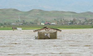 POWERFUL A damaged house appears to float in a flooded field in Tumauini town in Isabela province, one of dozens of towns devastated by Super Typhoon Lawin. AFP PHOTO 