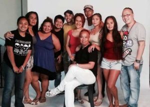 Louie Ignacio (seated) with the cast and crew of ‘Area’ including Ai Ai delas Alas (sixth from left) and Allen Dizon (in glasses)  