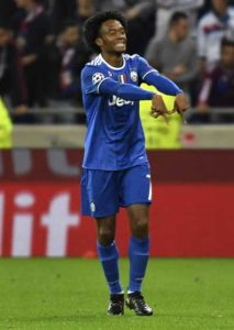 Juventus’ Colombian forward Juan Cuadrado celebrates after scoring a goal during the Champions League football match between Olympique Lyonnais and Juventus on Wednesday at the Parc Olympique Lyonnais stadium in Decines-Charpieu near Lyon, southeastern France. AFP PHOTO