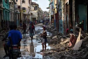 BACK TO SQUARE ONE A girl walks on a street damaged in hurricane Matthew, in Jeremie, in western Haiti, on Friday. The full scale of the devastation in hurricane-hit rural Haiti became clear as the death toll surged over 400, three days after Hurricane Matthew leveled huge swaths of the country’s south. AFP PHOTO