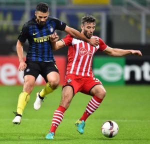 Southampton’s English defender Sam McQueen (right) challenges Inter Milan’s Italian midfielder Antonio Candreva during the Europa League group K football match between Inter and Southampton at the San Siro Stadium in Milan on Friday.  AFP PHOTO 