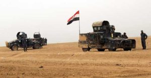 Iraqi forces gather in the al-Shura area, south of Mosul, on Monday during an operation to retake the main hub city from the Islamic State (IS) group jihadists. AFP / AHMAD AL-RUBAYE