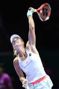 Germany’s Angelique Kerber serves against Madison Keys of the US in their women’s singles match during the WTA finals tennis tournament in Singapore on Thursday. AFP PHOTO 