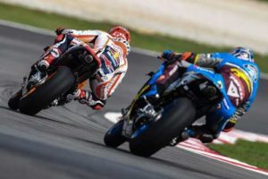 Repsol Honda Team’s Spanish rider Marc Marquez (left) and Estrella Galicia 0,0 Marc VDS Australian rider Jack Miller steer their bike during the third practice session of 2016 MotoGP Malaysian Grand Prix at Sepang International circuit on Saturday. AFP PHOTO