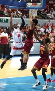 Arnaud Noah of SBC drives on Jeffrey Coronel of UPHSD during the semifinals of the NCAA Season 92 men’s basketball tournament at the MOA Arena in Pasay City. PHOTO BY RUSSELL PALMA