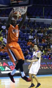 Allen Durham  of Meralco dunks  the ball during a PBA Governor’s Cup semifinals game at the Araneta Coliseum.   Photo by Russell Palma