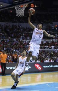 Chris Newsome of Meralco pulls off a break away dunk shot against Barangay Ginebra in Game 3 of the best-of-seven finals of Philippine Basketball Association Season 41 Governor’s Cup at the Araneta Coliseum on Wednesday. PHOTO BY RUSSELL PALMA