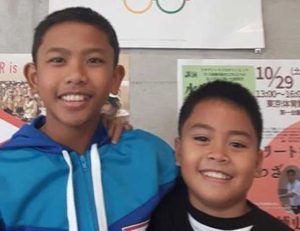 Veteran international campaigner Marc Bryan Dula (right) poses with Canada-based Angelo Macaraig after training at the Tokyo Metropolitan Gymnasium. Dula will be the first to compete in the 2016 Buccaneer Invitational Swimming Championship beginning today at the St. Mary’s International School swimming pool.  CONTRIBUTED PHOTO