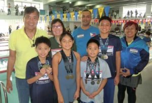 Philippine Swimming League President Susan Papa, NCR Regional Director Joan Mojdeh, coaches Alex Papa and Jeffrey Medrano with gold medalists Marc Bryan Dula, Micaela Jasmine Mojdeh, Rio Lorenzo Malapitan and Trump Christian Luistro. CONTRIBUTED PHOTO