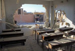 A general view of a damaged classroom at a school after it was hit by an air strike in the village of Hass, in the south of Syria’s rebel-held Idlib province on Wednesday. AFP / OMAR HAJ KADOUR