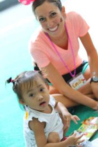 Emily Backes, a Child Life Specialist, with patient Sinai Gayta