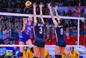 Generika’s Polina Luitikova hits the ball over Petron’s Serena Warner and Aiza Maizo-Pontillas during the Philippine Superliga Grand Prix on Saturday at the FilOil Flying V Center in San Juan. CONTRIBUTED PHOTO