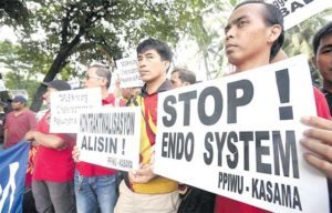 Members os KASAMA staged a protest at Intramuros Manila near the Department of Labor to oppose contractualization. PHOTO BY RUSSELL PALMA