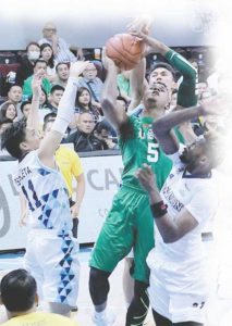 De La Salle University’s Abu Tratter tries to make a basket against three Adamson University defenders during the UAAP Season 79 men’s basketball tournament second round at the Mall of Asia Arena in Pasay City.  BOB DUNGO JR. 