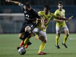 Loyola Meralco Sparks FC defender Joaquin Canas (left) battles with Jovin Bedic of Kaya FC in the United Football League on Saturday at the Rizal Memorial Football Stadium in Manila. PHOTO FROM UFL MEDIA