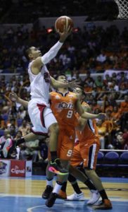 Barangay Ginebra’s LA Tenorio goes for a layup against Meralco’s Baser Amer during Game 2 of the 2016 PBA Governors’ Cup best-of-seven championship series on Sunday at the Araneta Coliseum. RUSSELL PALMA