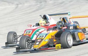 Mick Schumacher (29) battles it out with Kami Laliberte in the F4 season finale at Hockenheim, Germany. ADAC PHOTO