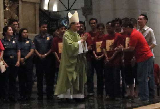 Cardinal Luis Antonio Tagle, the archbishop of Manila, blesses drug dependents who have turned themselves in for rehabilitation following Holy Mass at the Manila Cathedral on Sunday. Tagle launched ‘Sanlakbay para sa Pagbabagong Buhay,’ the archdiocese’s drug rehabilitation program featuring spiritual formation as well as livelihood and skills training. PHOTO BY BOB DUNGO JR.