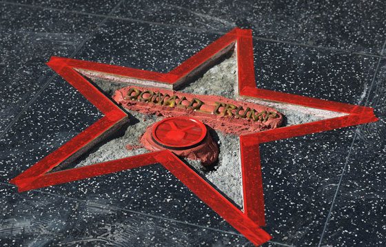 DEFACED Donald Trump’s Hollywood Walk of Fame Star is repaired after it was vandalized on October 26. AFP/GETTY IMAGES PHOTO BY KEVORK DJANSEZIAN 
