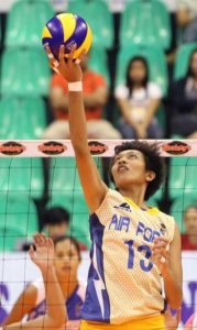 Air Force’s Dell Palomata (13) soars over her rivals in the Shakey’s V-League Reinforced Conference at the Philsports Arena. CONTRIBUTED PHOTO