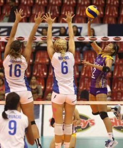 Foiled in her attacks, Customs’ Alyssa Valdez goes for a tip against the solid BaliPure defense put up by Amy Ahomiro (16) and import Kaylee Manns during their Shakey’s V-League Reinforced Conference clash. CONTRIBUTED PHOTO