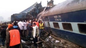 DEADLY DERAILMENT  Indian rescue workers search for survivors in the wreckage of a train that derailed near Pukhrayan in Kanpur district on November 20. Most of those killed sleeping when the fatal accident occurred, police said. AFP