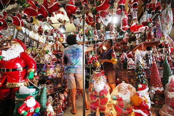 People shop for Christmas décor in a store in Dapitan St. in Quezon City as the country starts its countdown to the happiest season that is seven weeks away. PHOTO BY RUY L.  MARTINEZ